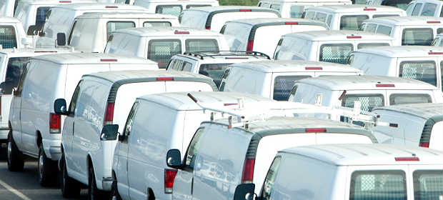 big fleet of white vans
