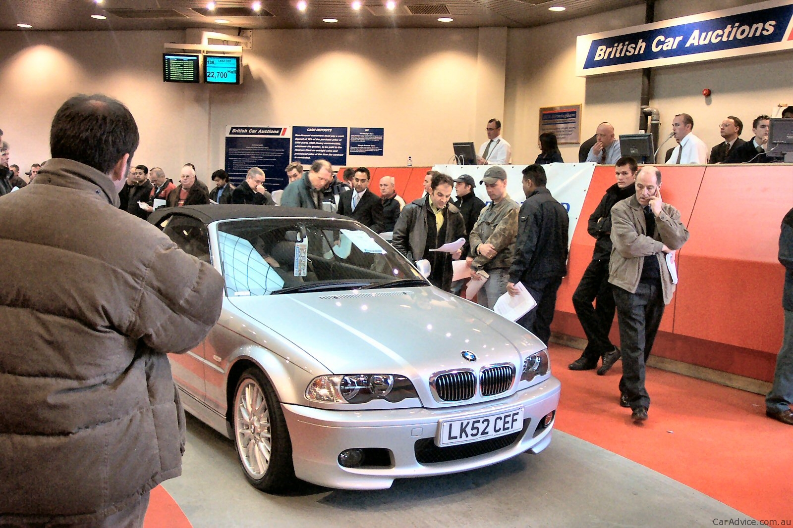 silver bmw car at auction